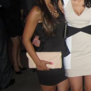 Black dress with peplum in the middle, lace back